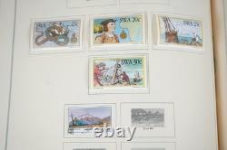 WORLDWIDE 1980s-1990s COLLECTION OF 1,550+ STAMPS MINT & USED IN SCOTT ALBUM