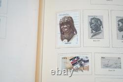 WORLDWIDE 1980s-1990s COLLECTION OF 1,550+ STAMPS MINT & USED IN SCOTT ALBUM