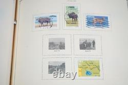 WORLDWIDE 1980s-1990s COLLECTION OF 1,550+ STAMPS MINT & USED IN SCOTT ALBUM