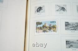 WORLDWIDE 1980s-1990s COLLECTION OF 1,550+ STAMPS MINT & USED IN SCOTT ALBUM