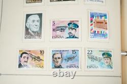 WORLDWIDE 1980s-1990s COLLECTION OF 1,550+ STAMPS MINT & USED IN SCOTT ALBUM