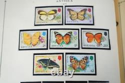 WORLDWIDE A/V 1970s COLLECTION OF 600+ MOSTLY MINT STAMPS STORED IN SCOTT ALBUM