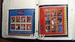 WW Disney stamp collection in Scott INT'L album with 1,200 or so stamps'98