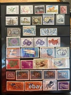 World Stamp Collection over 1,000 Stamps In Two Books Over 50 Countries