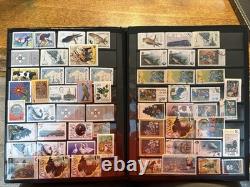 World Stamp Collection over 1,000 Stamps In Two Books Over 50 Countries