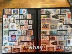 World Stamp Collection over 1,000 Stamps In Two Books Over 50 Countries