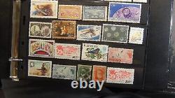 World Wide stamp collection in 3 ring binder on black stock pages est 2K stamps
