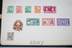 Worldwide Collection Of 1,100+ Stamps Mint & Used Stored In Album