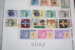 Worldwide Collection Of 1,250+ Stamps Mint & Used Stored In Harris Album