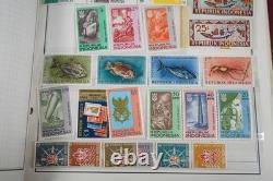 Worldwide Collection Of 1,250+ Stamps Mint & Used Stored In Harris Album