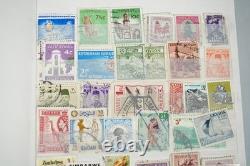 Worldwide Collection Of 1,375 Stamps Mostly Used Stored In Cruiser Stock Book