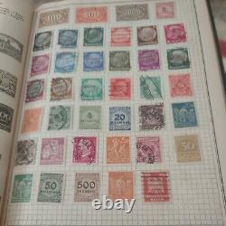 Worldwide boutique stamp collection in very old 1937 album. Vintage of course