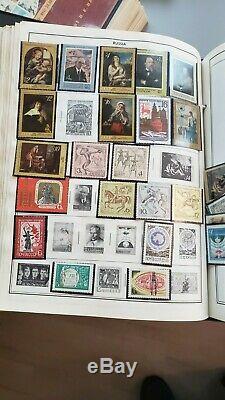 Worldwide collection of 4 Albums stuffed full of 1000's of stamps incl. U. S