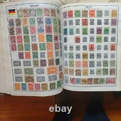 Worldwide immense stamp collection in Old Harris album. 1800s forward. IMMENSE