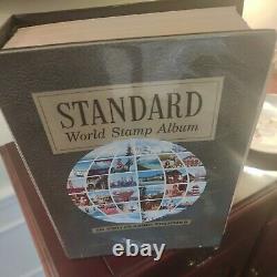 Worldwide stamp collection from 1800s forward in perfect Harris album. Super