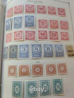 Worldwide stamp collection in Mammoth Scott album. 1868 forward. True vintage