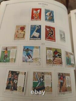 Worldwide stamp collection in Scott vintage international album 1850s forward