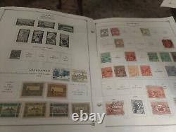 Worldwide stamp collection in Scott vintage international album 1850s forward