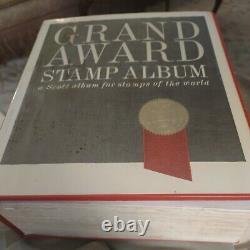 Worldwide stamp collection in grand award Scott album. Collection is 1800s fwd