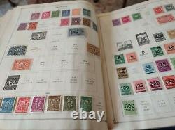 Worldwide stamp collection in vintage Scott postage stamp album. DON'T MISS THIS