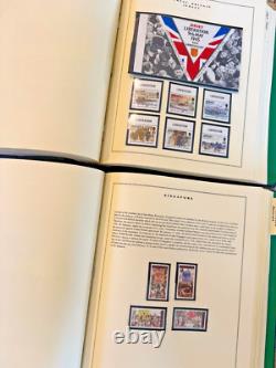 2 Albums de timbres-poste commémoratifs Scott de la Seconde Guerre mondiale 1989-1998 1 300 timbres internationaux MNH