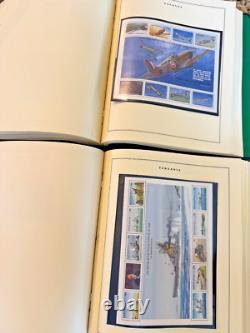 2 Albums de timbres-poste commémoratifs Scott de la Seconde Guerre mondiale 1989-1998 1 300 timbres internationaux MNH