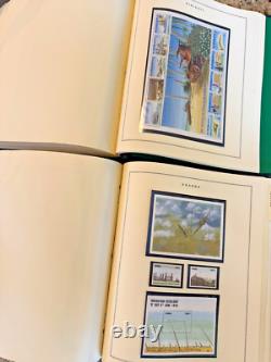 2 Albums de timbres-poste commémoratifs Scott de la Seconde Guerre mondiale 1989-1998 1 300 timbres internationaux MNH