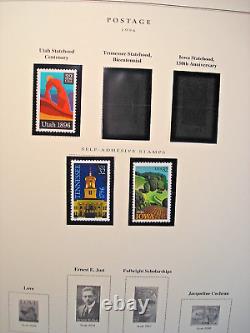 735 timbres neufs de la Monnaie des États-Unis dans l'album de timbres-poste nationaux de Scott de 1995 à 2002