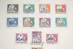 AFRIQUE BRITANNIQUE 1860s-1960s COLLECTION DE PLUS DE 2000 TIMBRES NEUFS ET USAGÉS ALBUM SCOTT