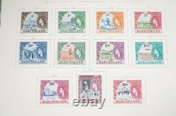 AFRIQUE BRITANNIQUE 1860s-1960s COLLECTION DE PLUS DE 2000 TIMBRES NEUFS ET USAGÉS ALBUM SCOTT