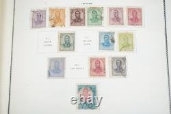 AMÉRIQUE DU SUD 1860s-1970s COLLECTION DE 2 100+ TIMBRES NEUFS ET USAGÉS DANS UN ALBUM SCOTT