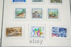 AUTRICHE 1850-2000 COLLECTION DE PLUS DE 1 500 TIMBRES NEUFS ET USAGÉS DANS UN ALBUM SCOTT