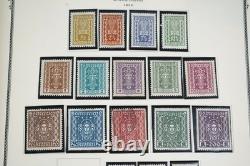 AUTRICHE ANNÉES 1850-1970 COLLECTION DE PLUS DE 700 TIMBRES NEUFS ET OBLITÉRÉS CONSERVÉS DANS UN ALBUM SCOTT