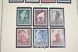 AUTRICHE ANNÉES 1880-1970 COLLECTION DE PLUS DE 470 TIMBRES NEUFS ET OBLITÉRÉS CONSERVÉS DANS UN ALBUM