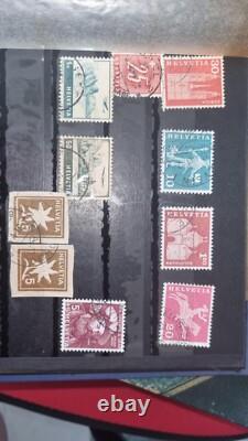 Album de collection de timbres trié par pays entre 500 et 700 pièces