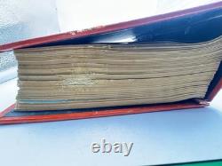 Album de timbres illustré vintage autour du monde avec quelques timbres à l'intérieur (tel quel)