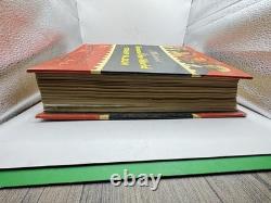 Album de timbres illustré vintage autour du monde avec quelques timbres à l'intérieur (tel quel)