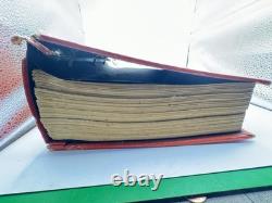 Album de timbres illustré vintage autour du monde avec quelques timbres à l'intérieur (tel quel)