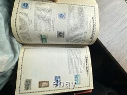 Album de timbres illustré vintage autour du monde avec quelques timbres à l'intérieur (tel quel)