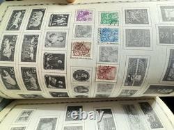 Album de timbres illustré vintage autour du monde avec quelques timbres à l'intérieur (tel quel)