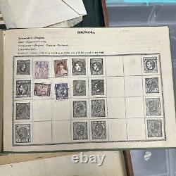 Album de timbres impériaux de 1899 partiellement rempli de timbres du monde entier.