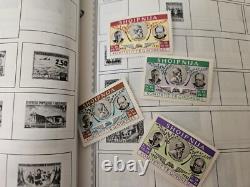 Album de timbres mondial complet Minkus, plusieurs pays Voir les photos