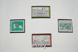 Allemagne Collection de plus de 700 timbres neufs et utilisés rangés dans un album sur pages quadrillées