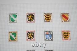 Allemagne Collection de plus de 700 timbres neufs et utilisés rangés dans un album sur pages quadrillées