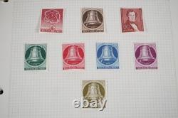 Allemagne Collection de plus de 700 timbres neufs et utilisés rangés dans un album sur pages quadrillées