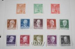 Allemagne Collection de plus de 700 timbres neufs et utilisés rangés dans un album sur pages quadrillées