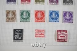 Allemagne Collection de plus de 700 timbres neufs et utilisés rangés dans un album sur pages quadrillées