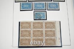 Allemagne années 1920 Inflation Collection de timbres blocs, demi-feuilles et exemplaires dans un album