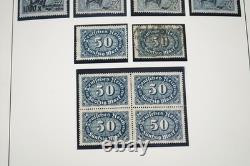 Allemagne années 1920 Inflation Collection de timbres blocs, demi-feuilles et exemplaires dans un album