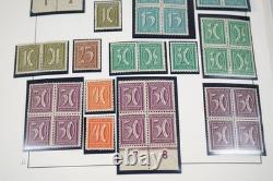 Allemagne années 1920 Inflation Collection de timbres blocs, demi-feuilles et exemplaires dans un album